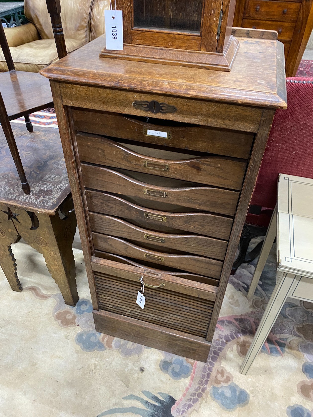 An early 20th century oak tambour filing cabinet, (no lock), width 49cm, depth 41cm, height 103cm
